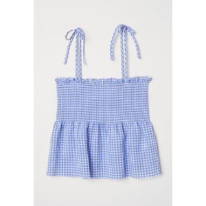 Top cu fronseuri si peplum