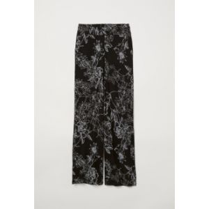 Pantaloni largi de jerseu