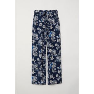 Pantaloni cu pliuri in talie