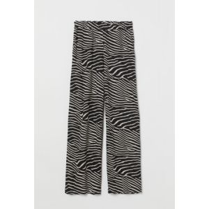 Pantaloni largi de jerseu
