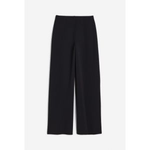 Pantaloni largi de jerseu