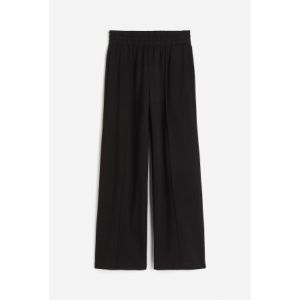 Pantaloni tip jogging largi de bumbac