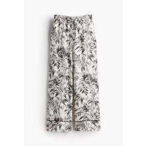 Pantaloni largi cu elastic in talie