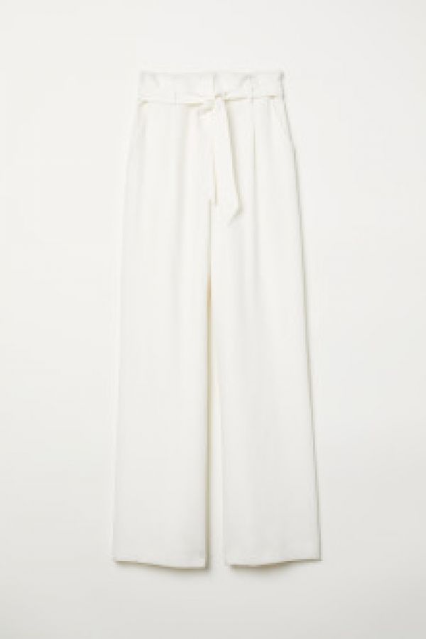  Pantaloni cu pliuri in talie
