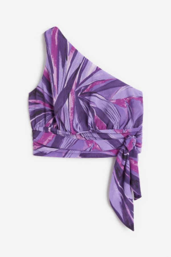  Top cropped cu un umar gol